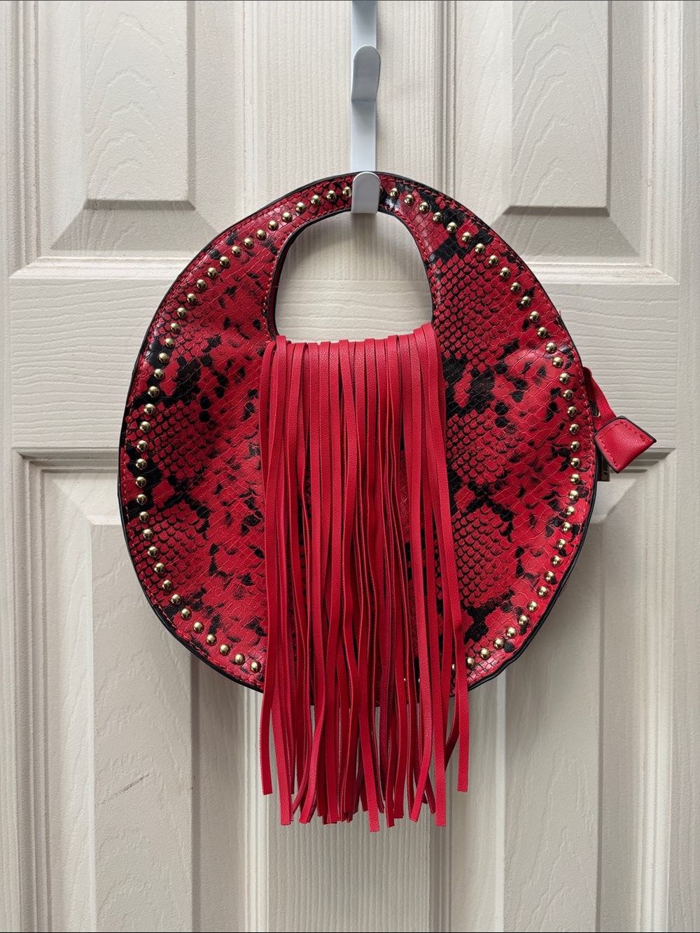 Red snake print hand bag
